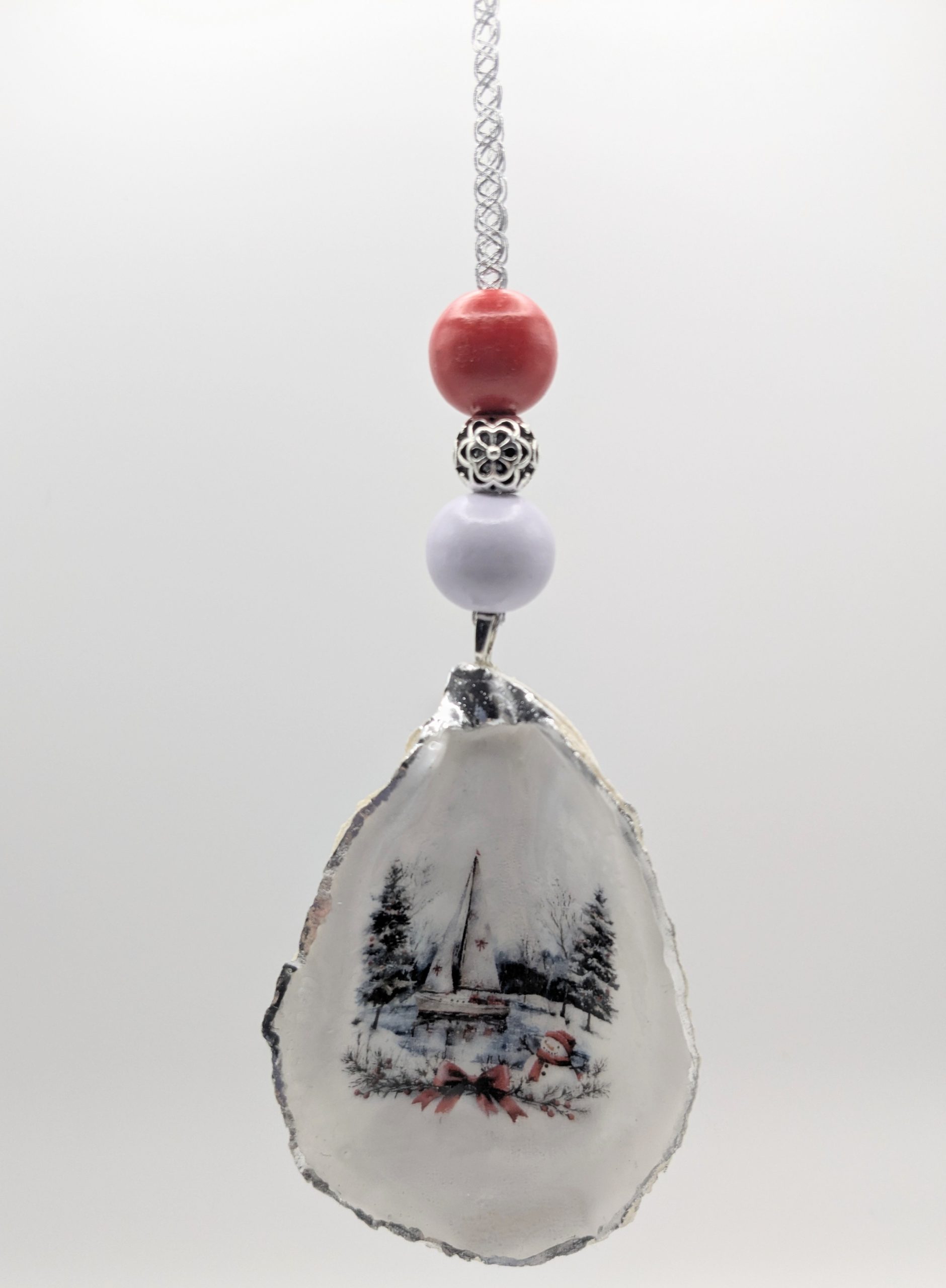 Winter Sailboat And Snowman On An Oyster Shell